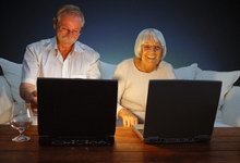 2063 senior couple on computers feature