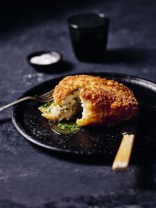 Crunchy fish kiev with herb butter