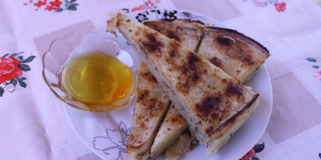 Flija is traditionally served with yoghurt and honey or jam