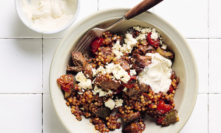 Greek lamb, tomato & pearl couscous bake