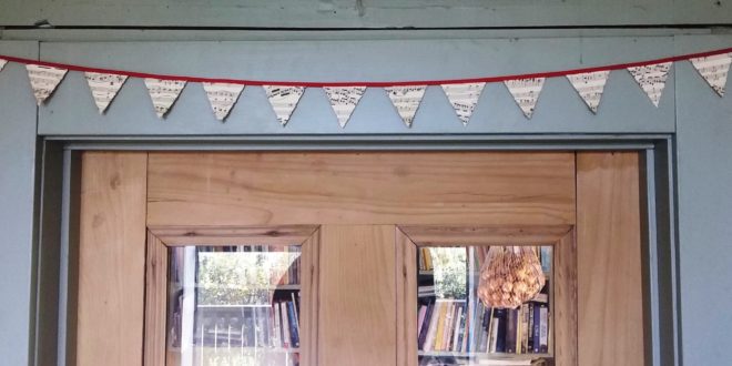 Hang your mini bunting on the door frame.