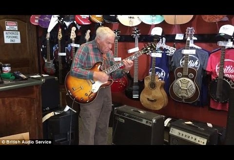 a grandpa in a guitar shop
