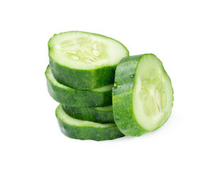 Stack of green cucumber slices isolated on white background